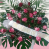 Centro de flores funeral rosas rojas