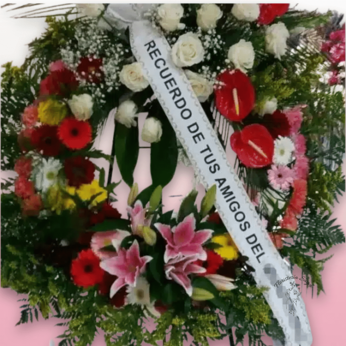 Corona funeraria con rosas, lilium y gerberas