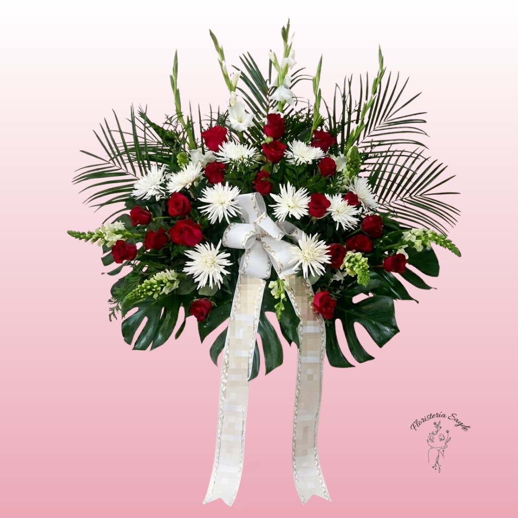 corona de flores blancas y lilium rosa (16) Centro funerario con anastasias y rosas rojas